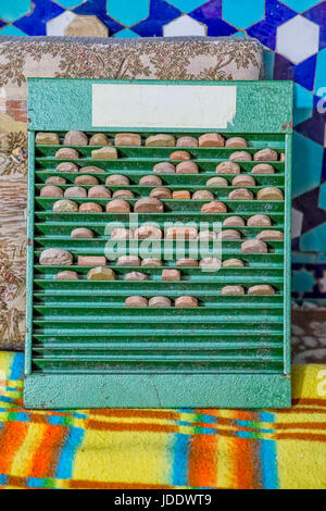 Praying Shia stone in the Yame mosque for use during salat, in old city Yazd in Iran. Stock Photo