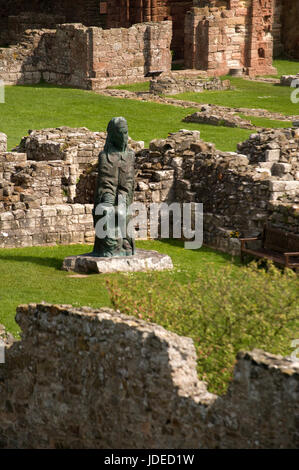 Statue of St Aidan at Lindisfarne Priory on Holy Island Stock Photo