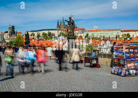 Crowds of tourists and stalls selling souvenirs on Charles Bridge, Prague, Bohemia, Czech Republic Stock Photo