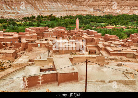 typical berber village with clay buildings in a valley near Ait-Ben-Addou, Morocco, Africa Stock Photo