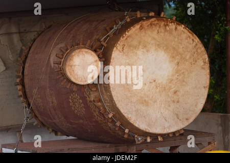 Drums next to the Stupa in Muang Xai, Laos during the sunset Stock Photo