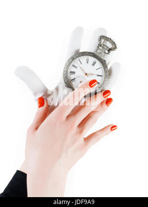 Ancient pocket watch in woman hands. Isolated on white, clipping path included Stock Photo