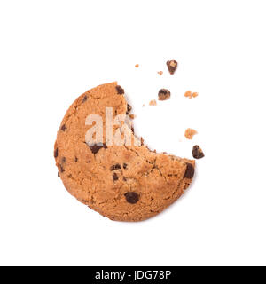 Single round chocolate chip biscuit with crumbs and bite missing, isolated on white from above. Sweet biscuits. Homemade pastry. Chocolate chip cookie Stock Photo