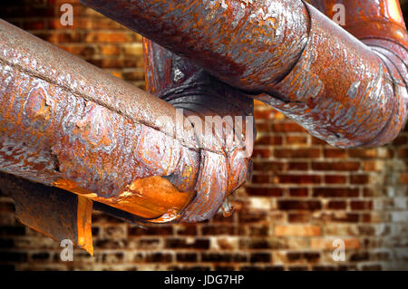 Rusty pipes, through many years. Stock Photo