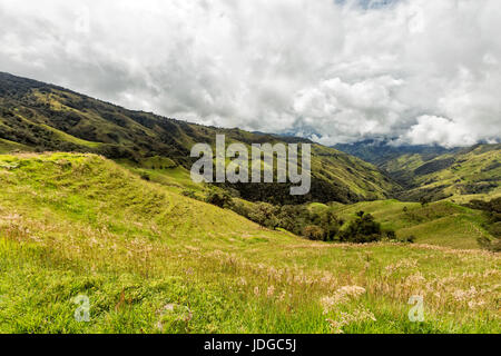 Clouds over pasture land in the mountains outside of Salento, Colombia. Stock Photo