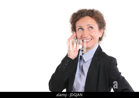 Beautiful smiling business woman talking on the phone. Business lady in dark suit is talking on the mobile phone and smiling, isolated on white Stock Photo