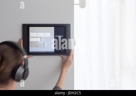 Smart home control on tablet. Stock Photo