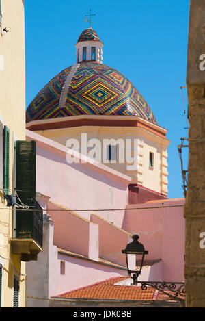 Alghero Sardinia, view of the San Michele church with its famous majolica-tiled dome in the old town area of Alghero, Sardinia. Stock Photo