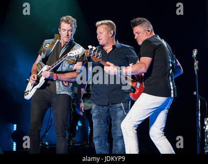 Jun. 9, 2017 - Nashville, Tennessee; USA - (L-R) Guitarist JOE DON ROONEY, Singer GARY LEVOX and Bass Guitarist JAY DEMARCUS of the band Rascal Flatts performs at Nissan Stadium as part of the 2017 CMA Music Festival that is taking place in downtown Nashville. The four day country music festival will attract thousands of fans from around the world to see a variety of artist on multiple stages. Copyright 2017 Jason Moore. Credit: Jason Moore/ZUMA Wire/Alamy Live News Stock Photo