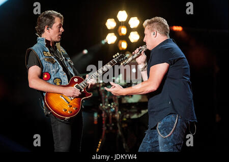 Jun. 9, 2017 - Nashville, Tennessee; USA -  Singer GARY LEVOX and Guitarist JOE DON ROONEY of the band Rascal Flatts performs at Nissan Stadium as part of the 2017 CMA Music Festival that is taking place in downtown Nashville.  The four day country music festival will attract thousands of fans from around the world to see a variety of artist on multiple stages.  Copyright 2017 Jason Moore. (Credit Image: © Jason Moore via ZUMA Wire) Stock Photo