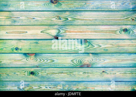 Light blue and green wooden background, old scratched wood