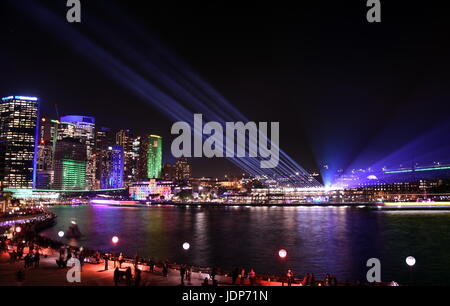 City lights and laser show in Circular Quay during the Sydney Vivid show, the free annual outdoor event of light music and ideas. View from Sydney Ope Stock Photo