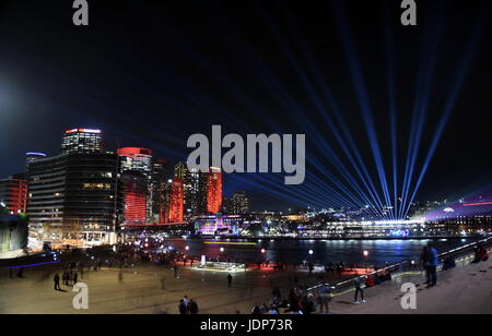 City lights and laser show in Circular Quay during the Sydney Vivid show, the free annual outdoor event of light music and ideas. View from Sydney Ope Stock Photo