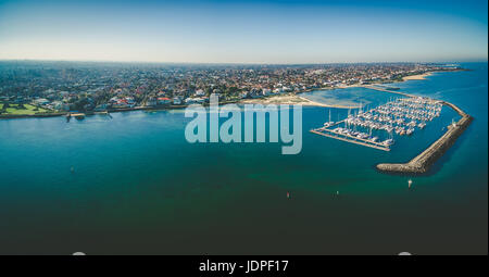 Aerial panorama of Middle Brighton Marina, coastline, and suburban area. Melbourne, Australia Stock Photo