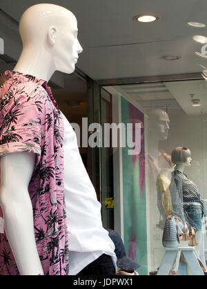 Manikin window display, River Island ladies and men clothing retailer, company founded in 1948 Stock Photo