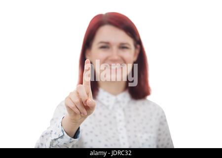 Young Smiling Businesswoman Student on blurred background touching digital interface with her finger. Stock Photo