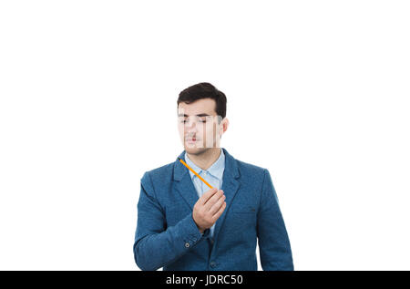 Young businessman man thinking about oportunities while holding a pencil in his hand.Idea Concept isolated on white background. Stock Photo