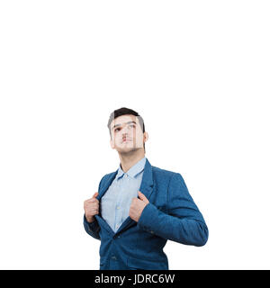 Young businessman acting with courage like a super hero and tearing his shirt off. Proud of yourself emotion isolated on white background. Stock Photo