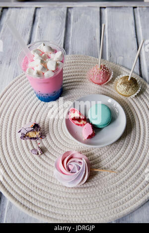 Beautiful sweets pastel shades on a beautiful wooden background. Aesthetic picture. dining, cooking, for children's parties Stock Photo