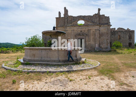 Monterano (also known as Ancient Monterano) is a ghost town in Italy , located in the province of Rome, perched on the summit plateau of the hill tuff Stock Photo