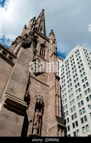 The current building of Trinity Church in Manhattan at Broadway and Wall Street was designed by Richard Upjohn. It was finished in 1846. Stock Photo