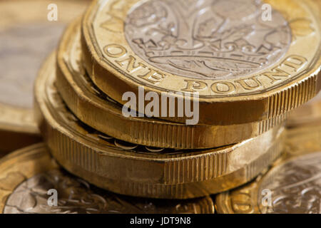 New 2017 British one pound coins in a vertical pile, United Kingdom currency Stock Photo