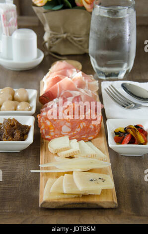 Ingredients and spaghetti on white plate. Stock Photo