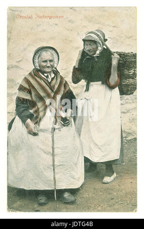 Original Edwardian era tinted colour postcard of Cornish Fisherwomen, wearing lace bonnets and shawls, carrying baskets or cauwals,  posted from St. Ives, Cornwall, U.K. August 1906 Stock Photo