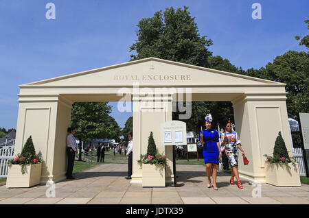 Female racegoers leave the Royal Enclosure during day two of Royal Ascot at Ascot Racecourse. Stock Photo