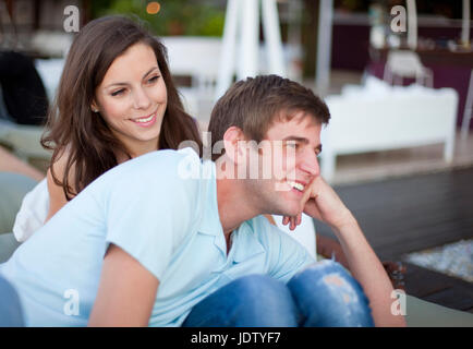 Smiling couple relaxing together Stock Photo