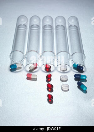 Medical test tube lying in a one use capsule on the hospital's green ...