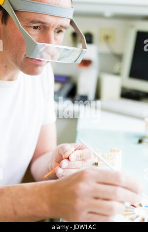Close up of scientist working in lab Stock Photo