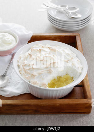 Dish of baked meringue and fruit Stock Photo