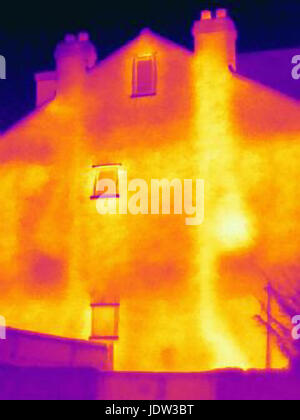 Thermal image of chimneys on house Stock Photo