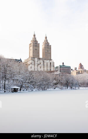 View of The San Remo building from Central Park lake in winter, Manhattan, New York City, USA Stock Photo