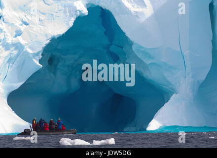 Boat and iceberg, ice floe in the Southern Ocean, 180 miles north of East Antarctica, Antarctica Stock Photo