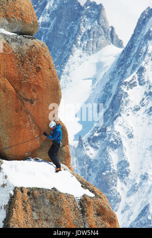 Mature man mountain climbing, Chamonix, France Stock Photo