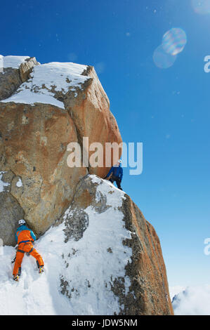 Two men mountain climbing, Chamonix, France Stock Photo