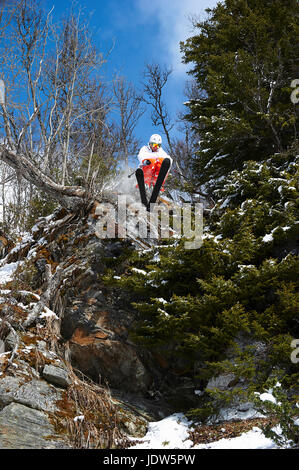 Skier jumping off rocks, Are, Sweden Stock Photo