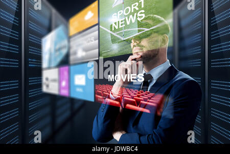man in virtual reality headset with multimedia Stock Photo