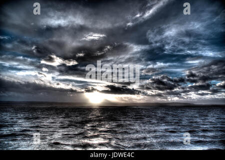 Marine Lake West Kirby on the Wirral during stormy sunset Stock Photo