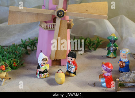 Dutch nativity scene with Holland windmill and the Three Kings who bring gifts Stock Photo