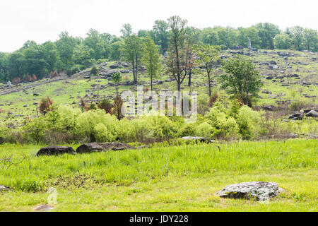 Gettysburg, USA - May 24, 2017: Little Round Top New York Monument in Gettysburg battlefield national park during summer with people Stock Photo