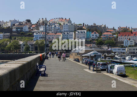 People Walking on Castle Pier, Saint Peter Port, Guernsey Stock Photo