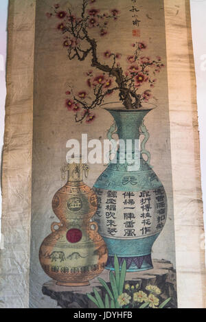 Traditional scroll with a Chinese painting of a vase with blossom, Wei Tai Hou Draft Bank Museum, Pingyao, Shanxi province, China Stock Photo