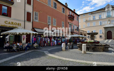 Central square (Piazza della Libertà) in village of Castel Gandolfo with Pope's summer Palazzo Pontificio Stock Photo