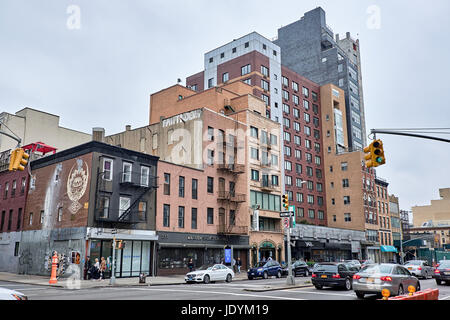 NEW YORK CITY - OCTOBER 02, 2016: Apartment building from various periodes on Bowery Street with traffic Stock Photo