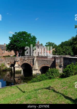 The Ancient, 14th Century, Bishop Bridge, spanning The River Wensum in Norwich, Norfolk, England, UK Stock Photo