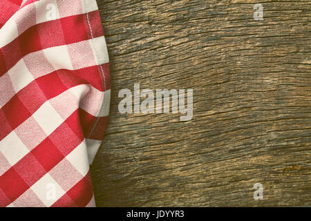 the red tablecloth over old wooden table Stock Photo