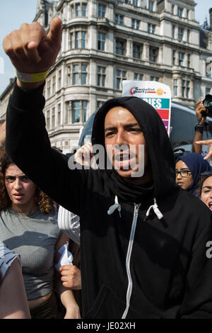 London, UK. 21st June, 2017. Protesters block Westminster Bridge Road at the end of a 'Day of Rage' march by activists from Movement For Justice By Any Means Necessary from Shepherds Bush Green to Parliament Square to demand justice for those affected by the fire in the Grenfell Tower and to call for a change of government on the day of the Queen's Speech in Parliament. Credit: Mark Kerrison/Alamy Live News Stock Photo